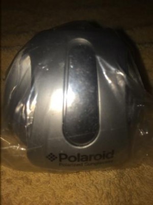 непонятная штука поляройд, предположительно держатель чего то